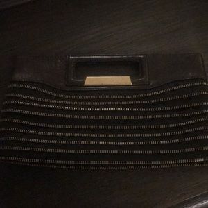 Never used BCBG super unique zipper cutout purse